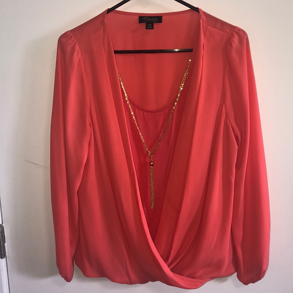 Peach colored crossbody top with necklace 🍑